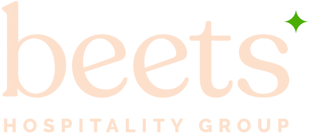 Refreshed Beets Hospitality Group logo in soft pink with a green sparkle accent