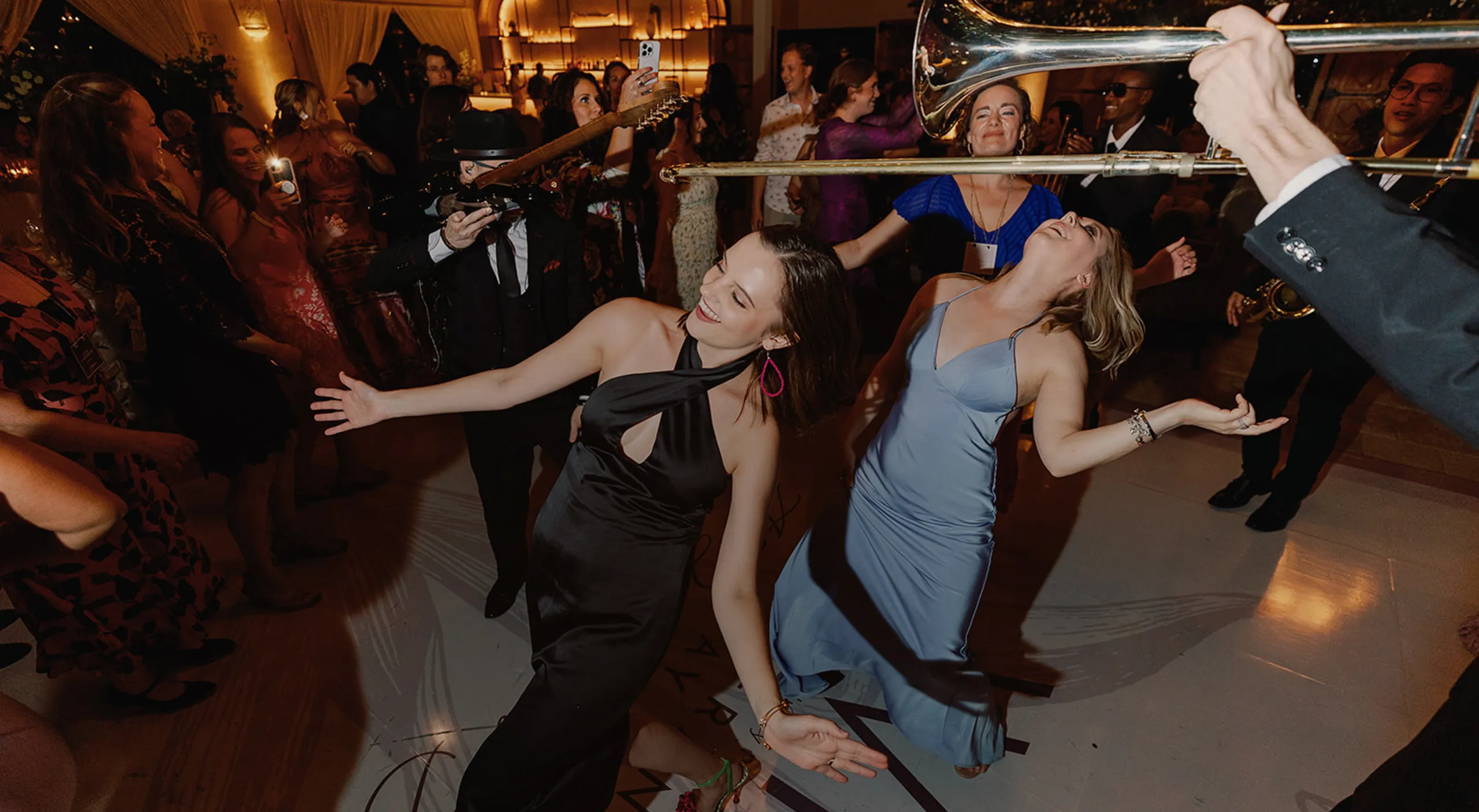Guests dancing to live music at a Beets Hospitality event